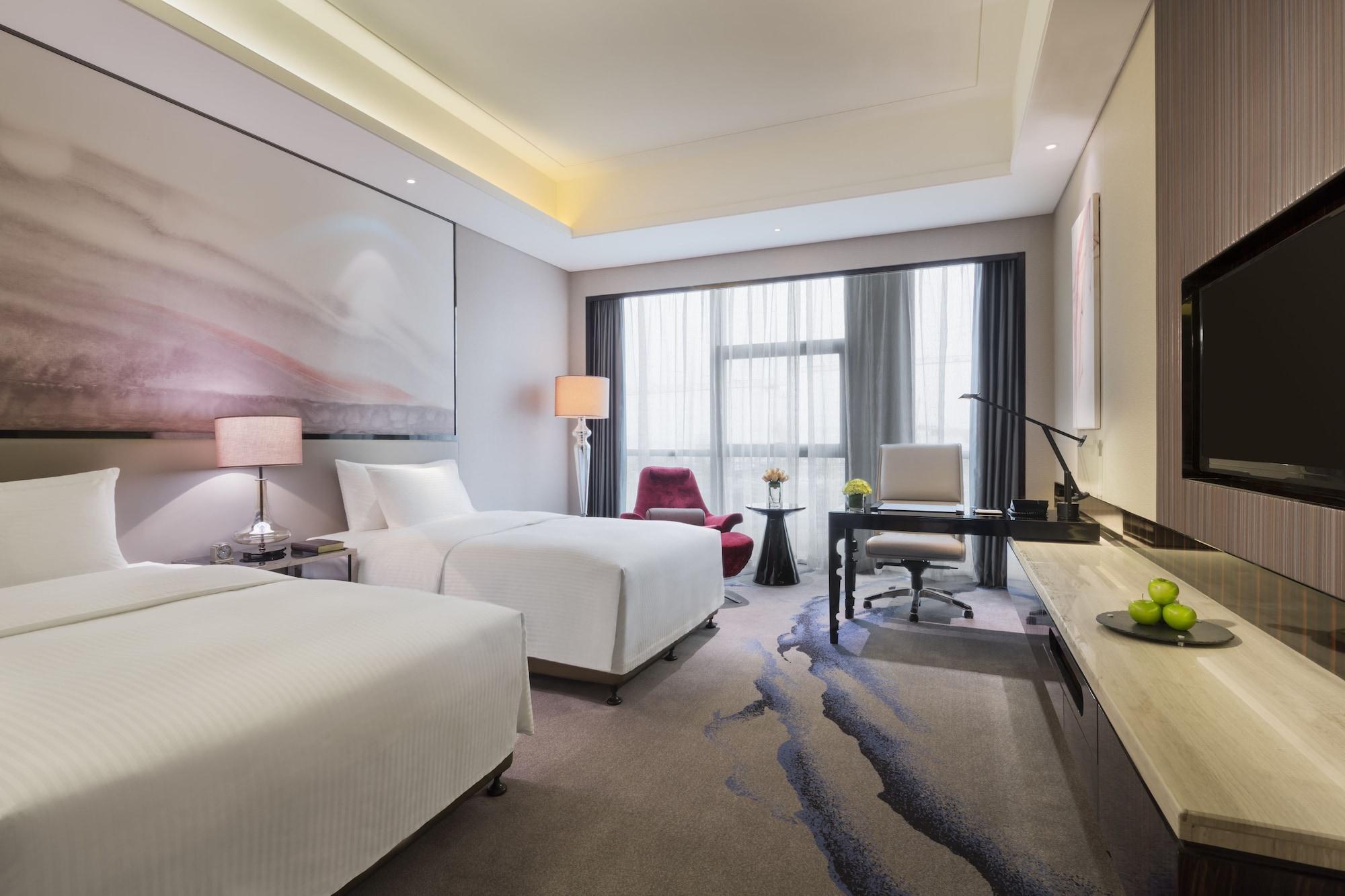 ว่านต้า เรล์ม อู่ฮั่น Hotel ภายนอก รูปภาพ